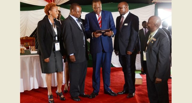 Members of the Board of the Kenya USA Diaspora SACCO with President Kenyatta at a luncheon they hosted in honor of  participants  of Diaspora Conference held at Windsor Golf and country club in April, 2015.