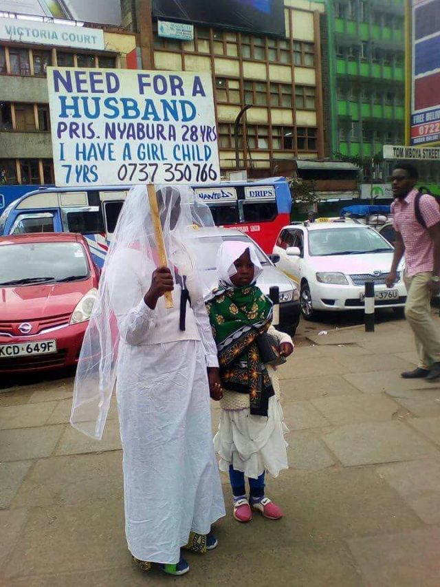 Woman Carries Placard in Streets of Nairobi in Search of Husband 