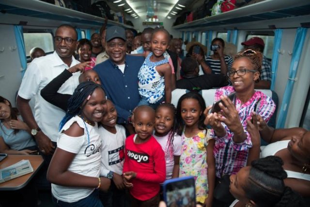 President Kenyatta Surprises Commuters As He Boards SGR Passenger Train Madaraka Express to Mombasa